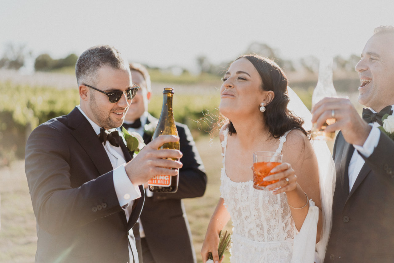 Bride drinking champagne at Golding Winery Wedding in the Adelaide HIlls.