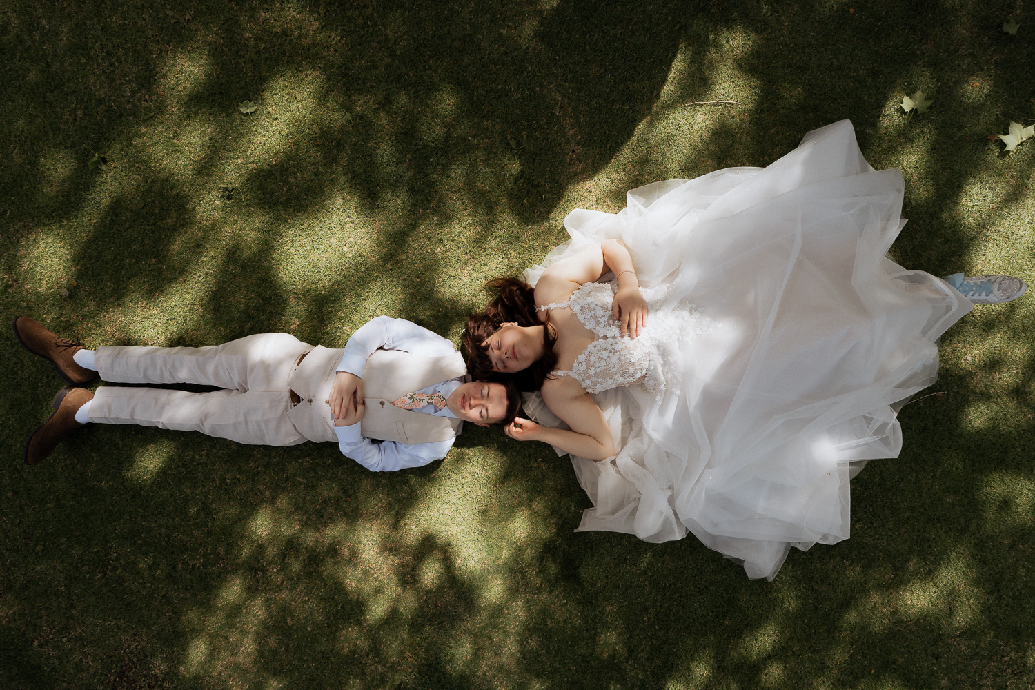 Couple lying on the lawns at Mandalay House