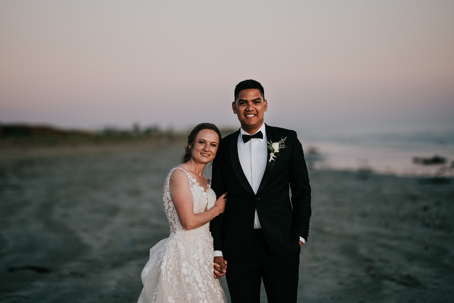 Sunset photos of wedding couple at Middle Beach